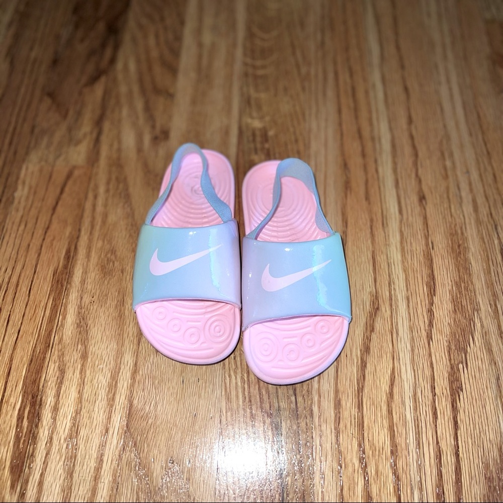 Toddler Nike slides.